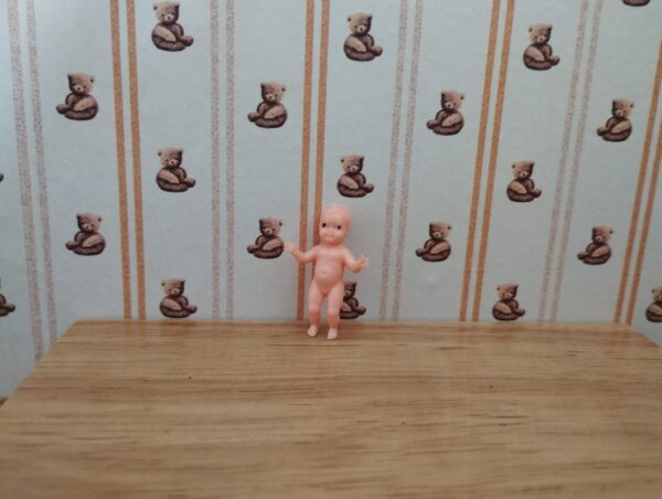 Babypuppe aus Kunststoff, klein, Miniatur